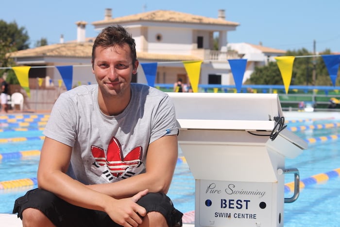 Ian Thorpe beside a starting block at the BEST Swim Centre